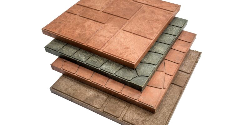 eco-parking paving slabs made of recycled plastic waste isolated on white background