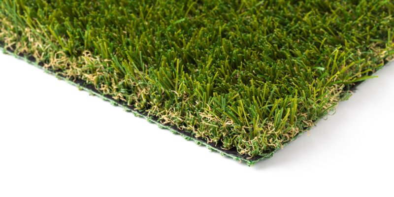 Section of Artificial Turf Grass On White Background